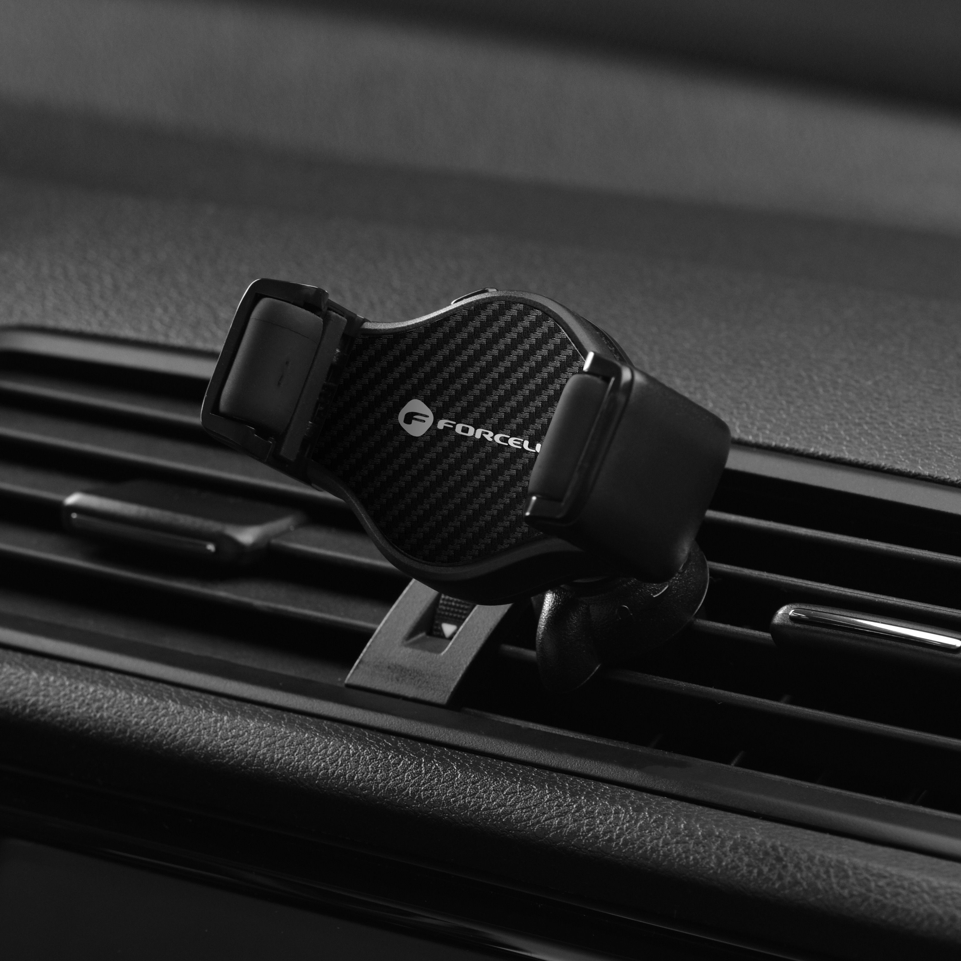 Uchwyt samochodowy Forcell F-Grip Carbon H-CF509 do kratki nawiewu czarny Samsung Galaxy F22 4G / 7 Uchwyt samochodowy Forcell F-Grip Carbon H-CF509 do kratki nawiewu czarny Samsung Galaxy F22 4G / 7